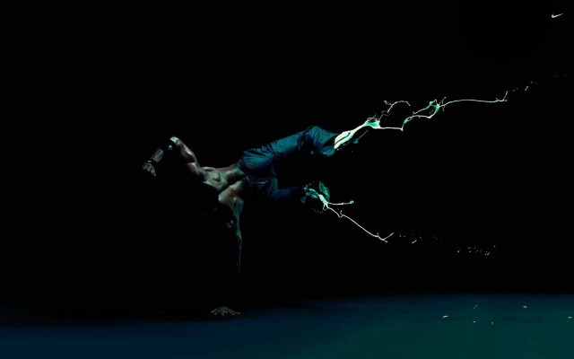 Skateboarder trick dark blacklight night free wallpaper for desktop - medium preview image