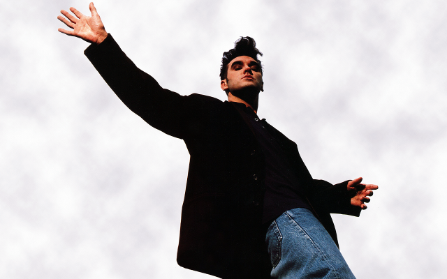 Man black jacket arms out free wallpaper for desktop - medium preview image