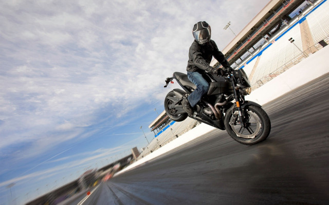 Man motorcycle riding cloudy sky free wallpaper for desktop - medium preview image