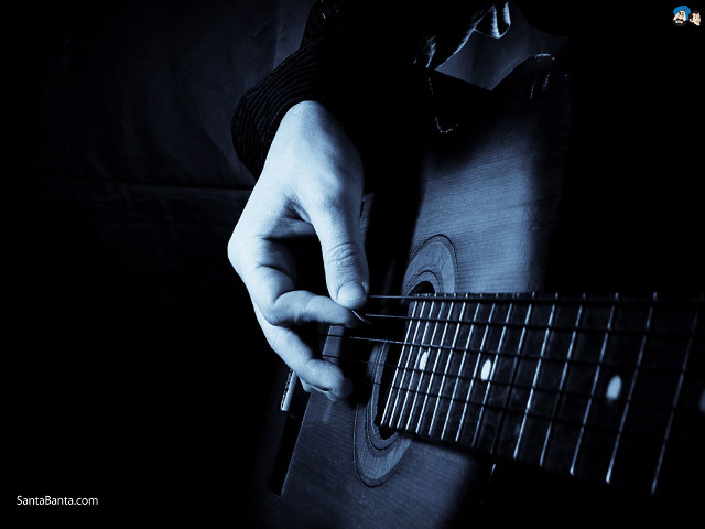 Person playing guitar dark fingers free wallpaper for desktop - medium preview image