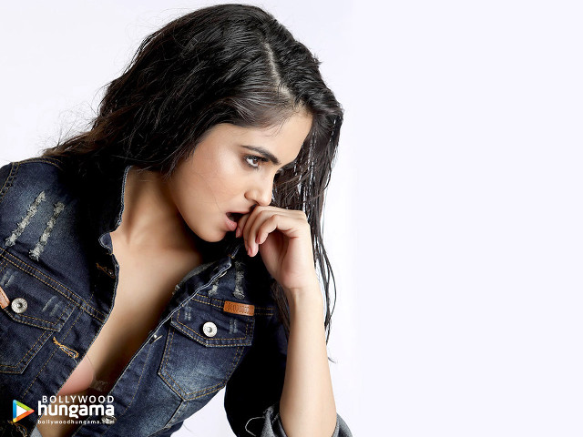 Woman denim jacket posing hand free wallpaper for desktop - medium preview image