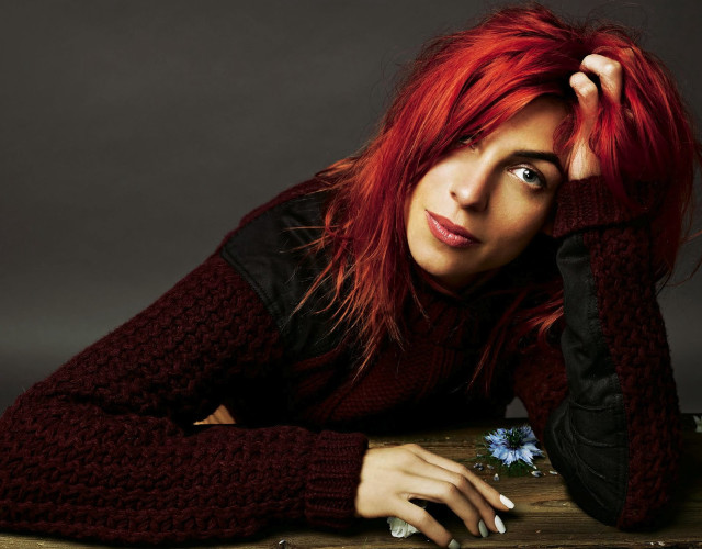 Woman red hair sweater pose free wallpaper for desktop - medium preview image