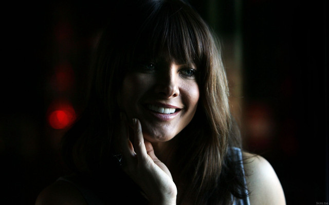 Woman smiling hand face black free wallpaper for desktop - medium preview image