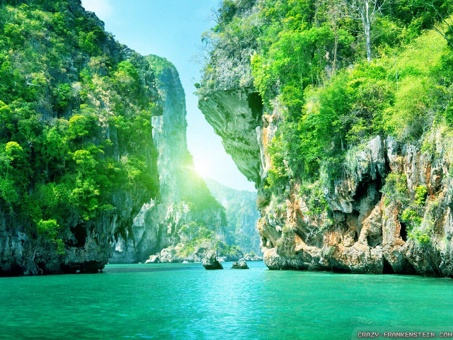 Mountain water boat cliff view free wallpaper for desktop - medium preview image