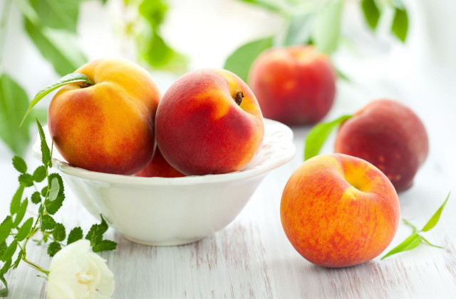 Bowl of peaches white table free wallpaper for desktop - medium preview image