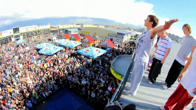 Group stage crowd watching man free wallpaper for desktop - medium preview image