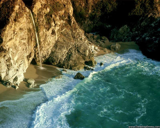 Beach waterfall rocks ocean water free wallpaper for desktop - medium preview image