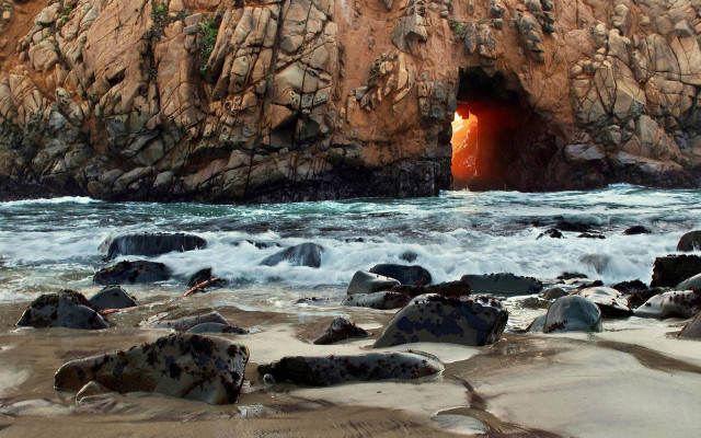 Cave entrance red light ocean free wallpaper for desktop - medium preview image