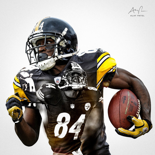 Football player holding ball uniform free wallpaper for tablet - medium preview image