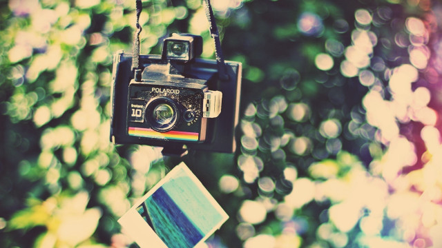 Camera chain polaroid print hanging free wallpaper for desktop - medium preview image