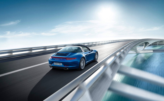 Blue sports car highway bridge free wallpaper for desktop - medium preview image