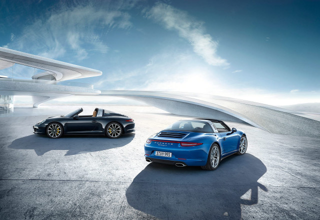 Blue sports cars parked building free wallpaper for desktop - medium preview image