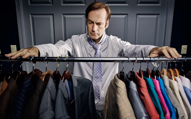 Man standing ties suits closet free wallpaper for desktop - medium preview image