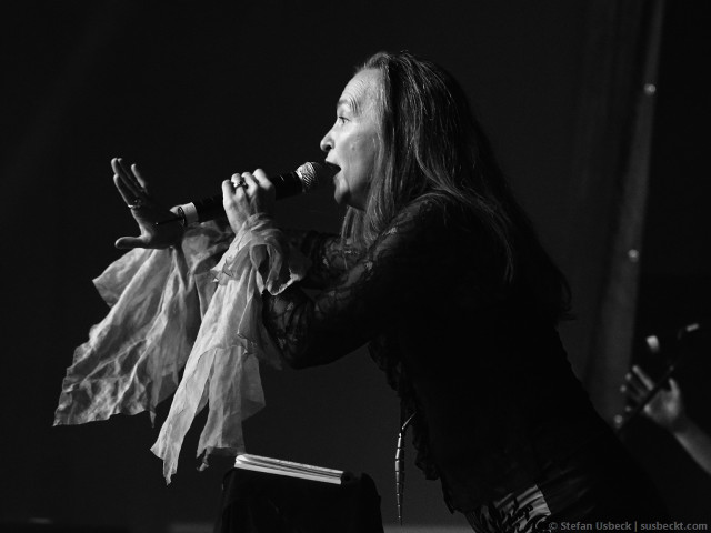 Woman singing microphone stage book free wallpaper for desktop - medium preview image