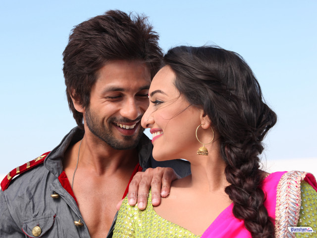 Smiling man woman posing together free wallpaper for desktop - medium preview image