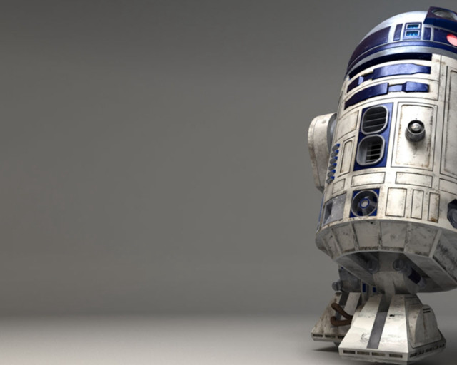 Robot standing table gray background #2 free wallpaper for desktop - medium preview image