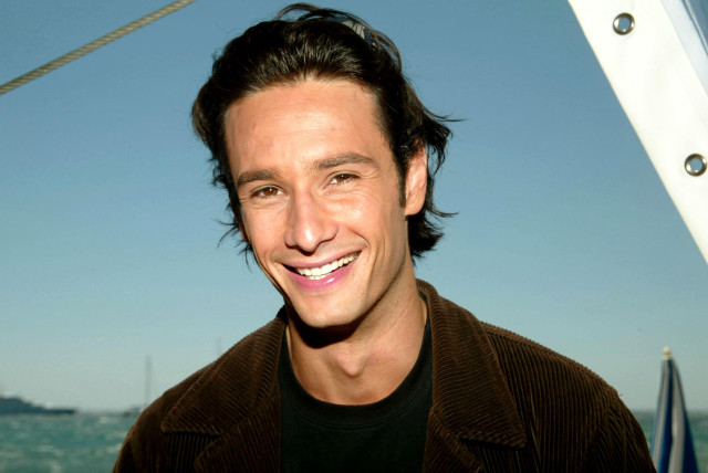 Smiling man boat ocean background free wallpaper for desktop - medium preview image