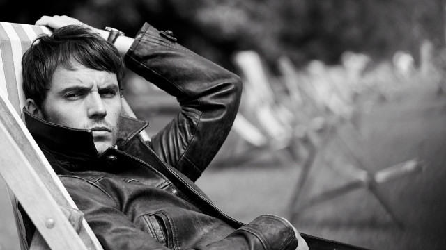 Man sitting chair head hands free wallpaper for desktop - medium preview image