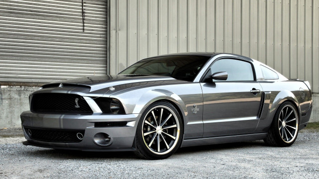 Silver mustang parked building garage free wallpaper for desktop - medium preview image
