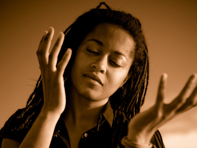 Woman dreadlocks hands up closed free wallpaper for desktop - medium preview image