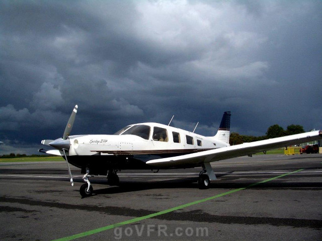 Small plane cloudy sky mountain free wallpaper for desktop - medium preview image