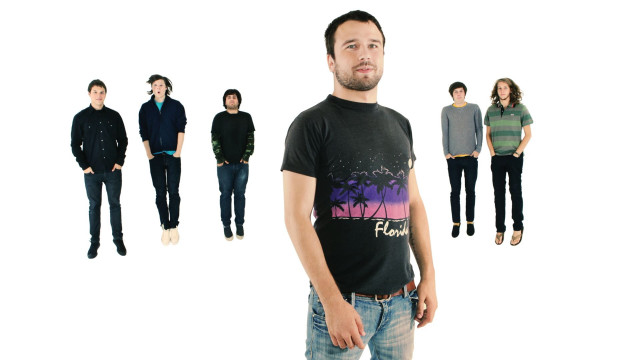 Man standing group people tshirts free wallpaper for desktop - medium preview image