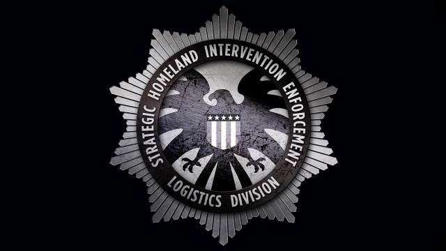 Black background white eagle badge free wallpaper for desktop - medium preview image