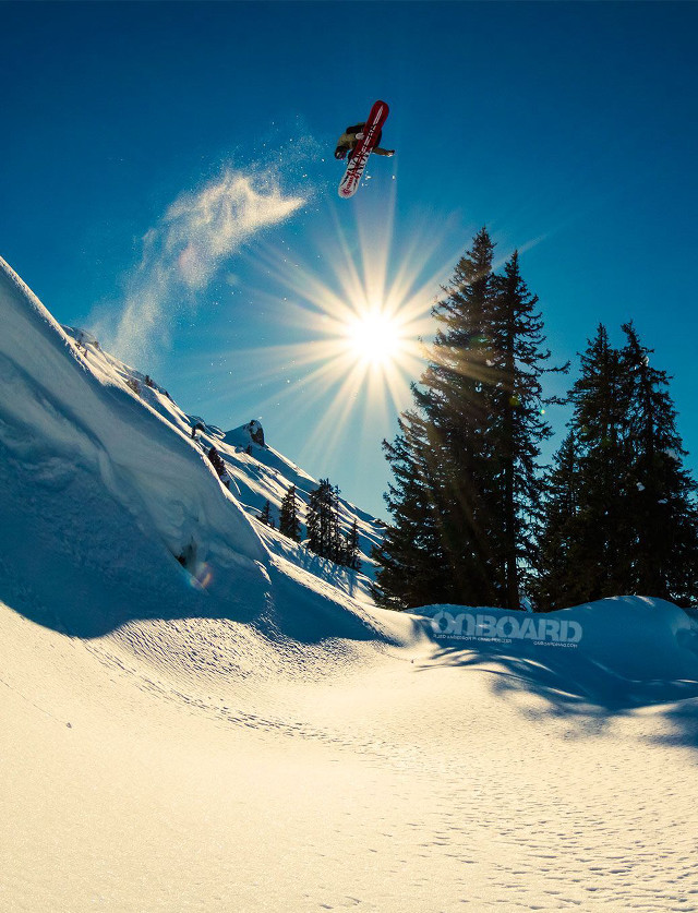 Snowboard jump sunshine hill trees free wallpaper for mobile - medium preview image
