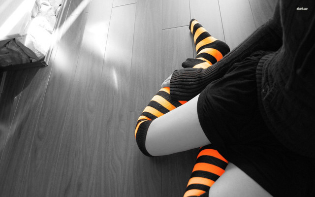 Person striped socks sitting floor free wallpaper for desktop - medium preview image
