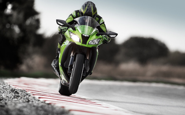 Motorcycle rider green tiltshift outdoors free wallpaper for desktop - medium preview image