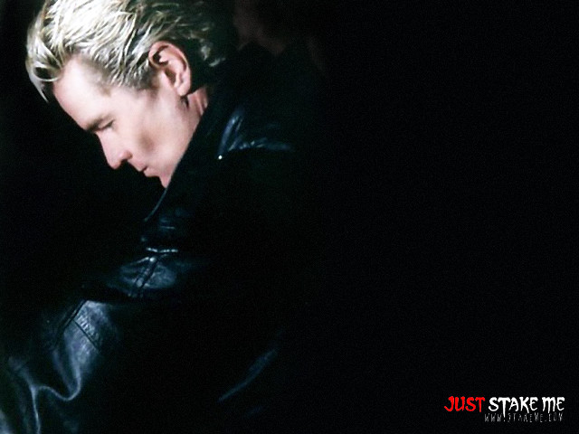 Man black jacket looking down free wallpaper for desktop - medium preview image