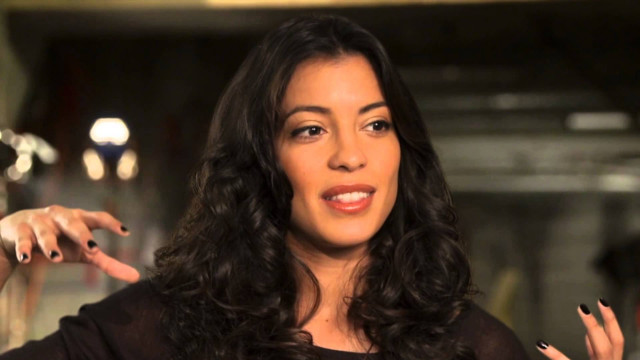 Woman long black hair pointing free wallpaper for desktop - medium preview image