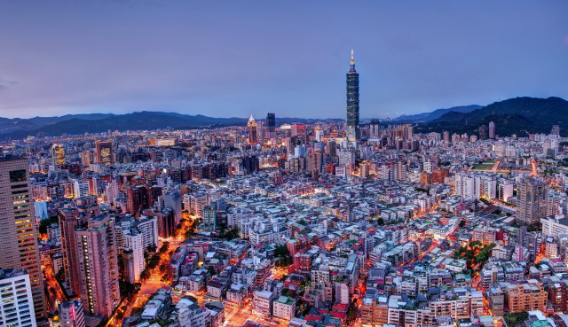 Cityscape tall building nighttime lights free wallpaper for desktop - medium preview image