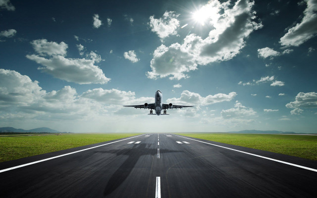 Jetliner flying runway blue sky free wallpaper for desktop - medium preview image