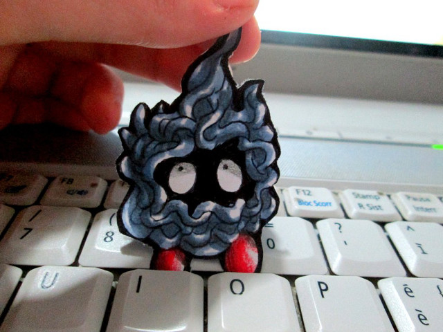 Person holding toy keyboard computer free wallpaper for desktop - medium preview image