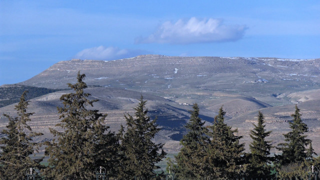 Mountain range trees sky background free wallpaper for desktop - medium preview image