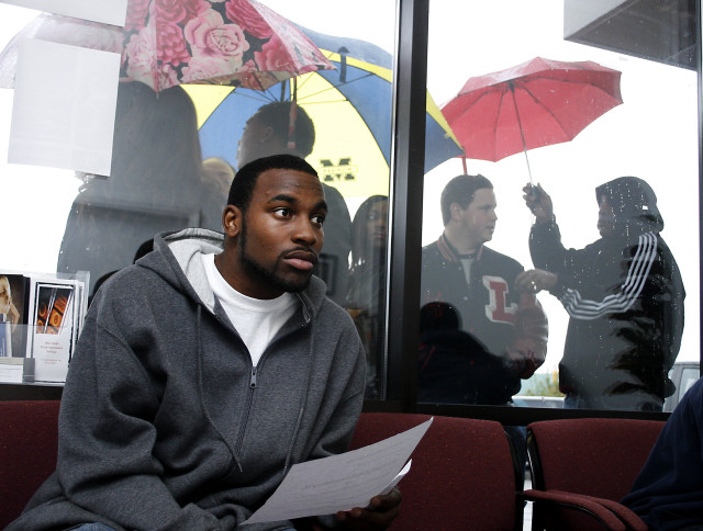 Man sitting couch umbrella paper free wallpaper for desktop - medium preview image