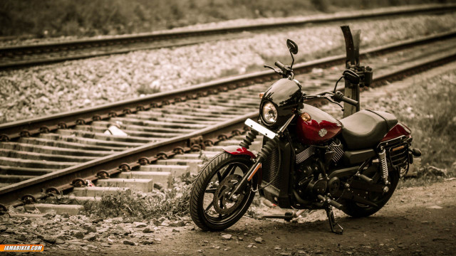 Motorcycle parked train track bird free wallpaper for desktop - medium preview image