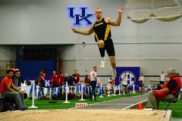 Man jumping track crowd stadium free wallpaper for desktop - medium preview image