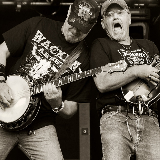 Two men playing musical instrument free wallpaper for tablet - medium preview image