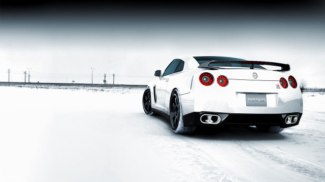 White sports car snowy road #4 free wallpaper for desktop - medium preview image