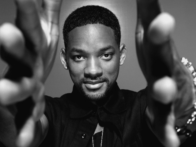 Man holding two fingers black free wallpaper for desktop - medium preview image