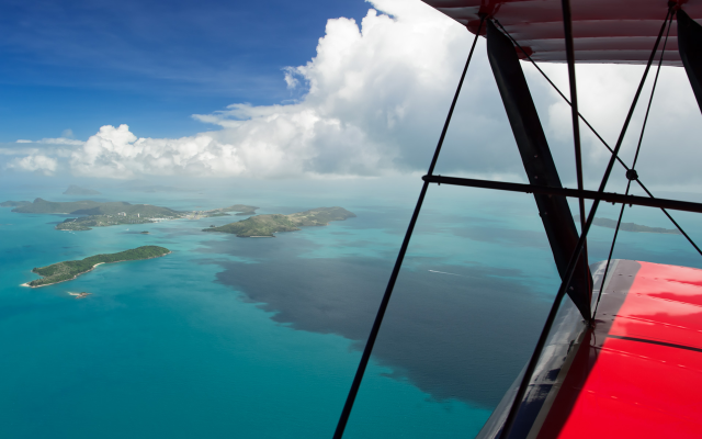 Tropical island plane window ocean free wallpaper for desktop - medium preview image