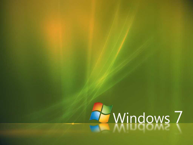 Green background windows7 logo reflection free wallpaper for desktop - medium preview image