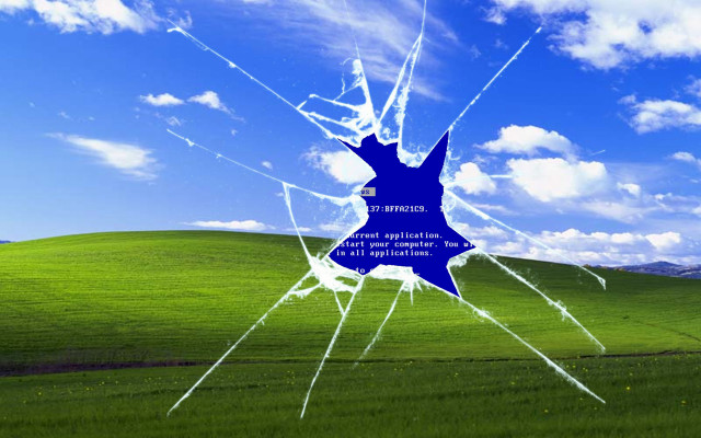 Cracked window green field blue free wallpaper for desktop - medium preview image