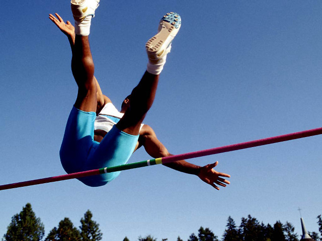 Woman high jump pole shoes free wallpaper for desktop - medium preview image