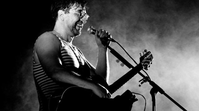 Man glasses guitar singing microphone free wallpaper for desktop - medium preview image