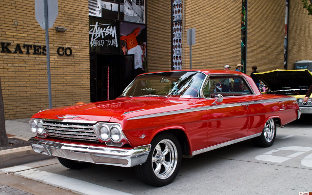 Red car parked side road free wallpaper for desktop - medium preview image