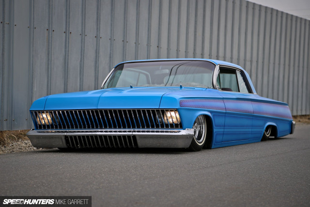 Blue car parked road building free wallpaper for desktop - medium preview image