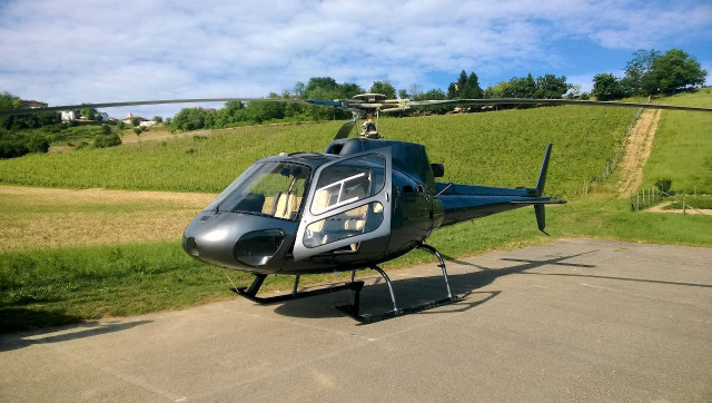 Helicopter parked runway field grass free wallpaper for desktop - medium preview image